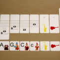 Tónová sústava - ukážka autokorekcie na rube kariet (noty v basovom kľúči) - správne riešenie